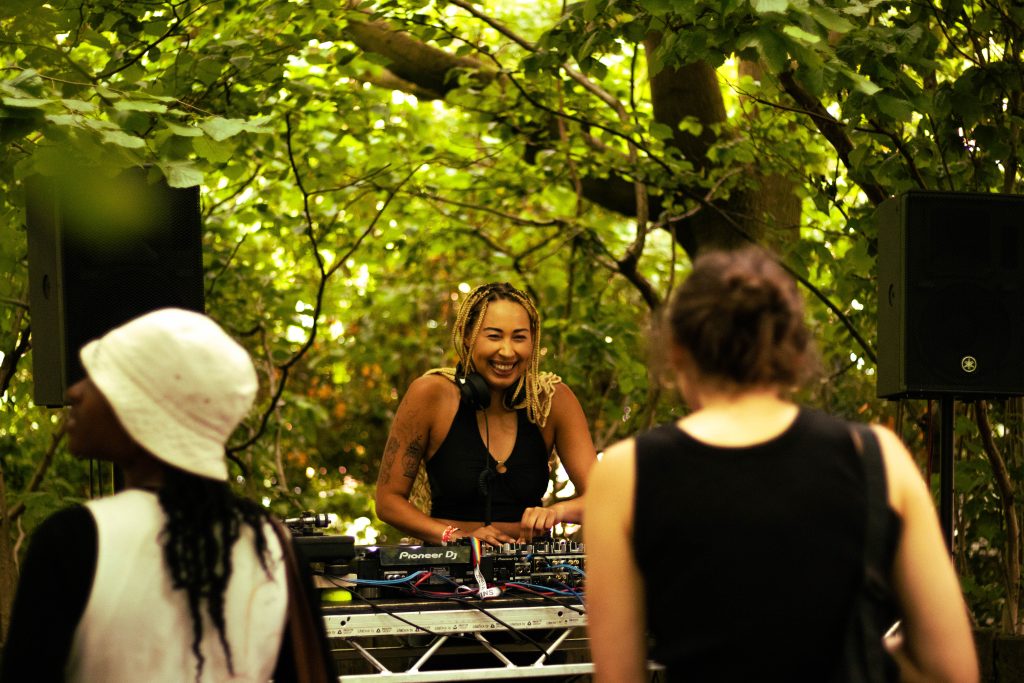 Charmz DJing at Green Island Festival.