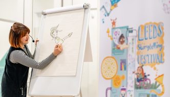 Image of woman drawing a children's illustration on a whiteboard.